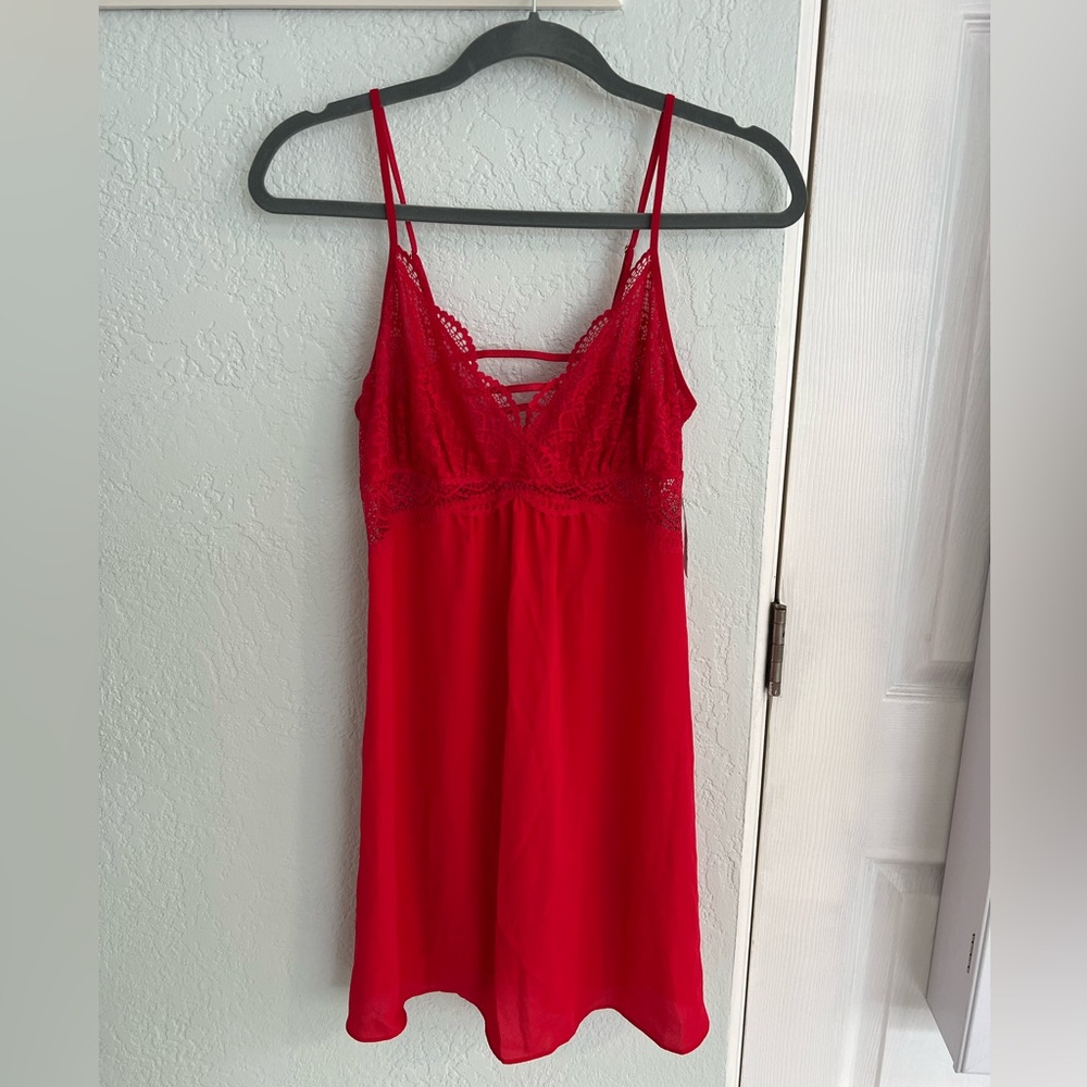Red lingerie, fits size medium. Never worn with tags!